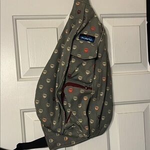 Kavu Olive Owl Print Sling Bag with Red Accents